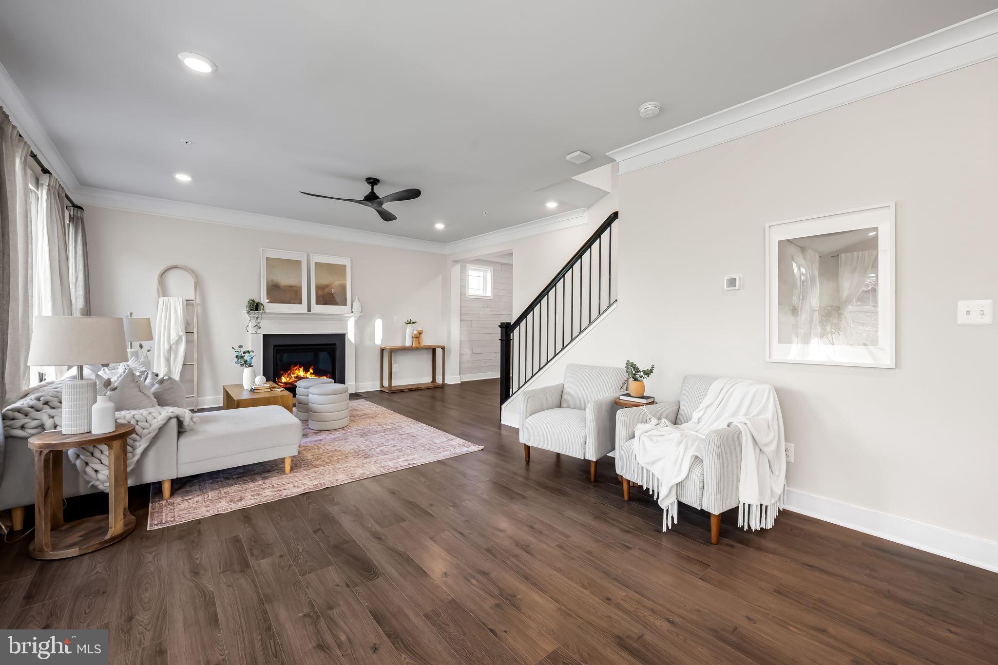 3704 Kahl Farm Road Perry Hall, MD 21128 - Photo 11 of 52 a living room with fireplace furniture and a wooden floor