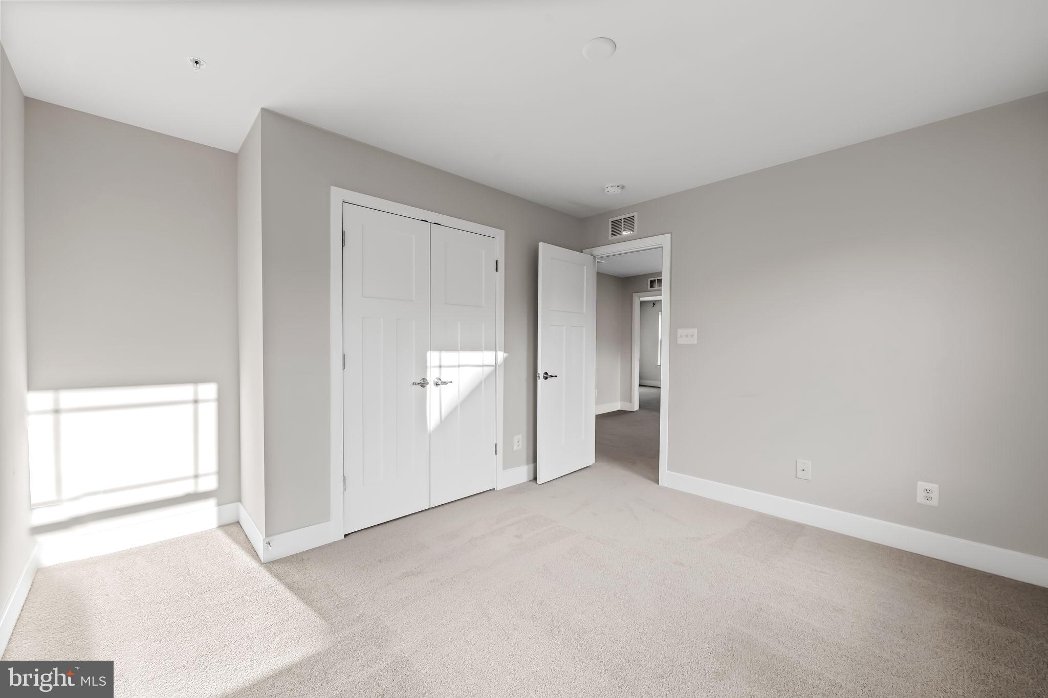 3704 Kahl Farm Road Perry Hall, MD 21128 - Photo 26 of 52 an empty room with a natural light