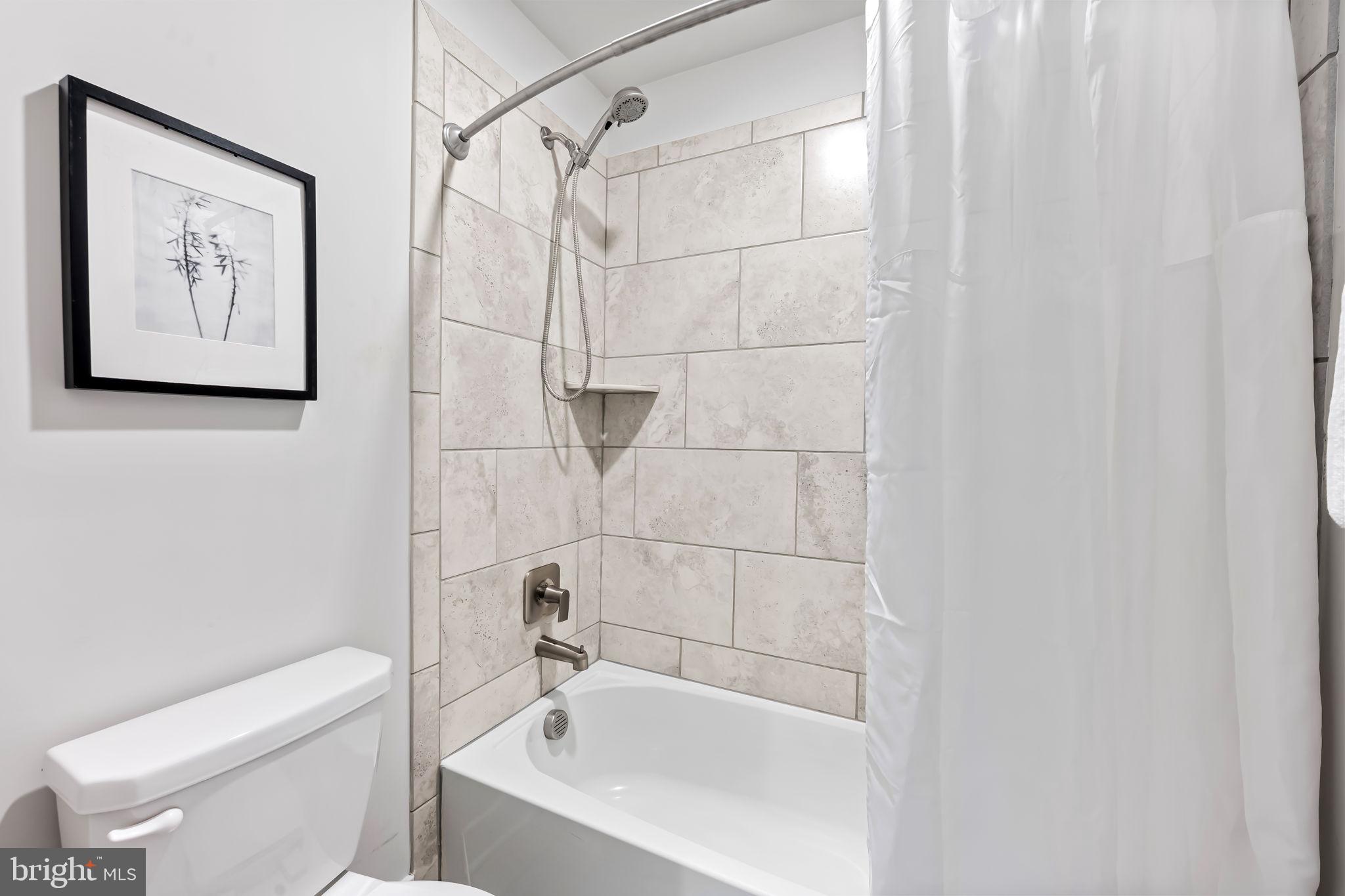 3704 Kahl Farm Road Perry Hall, MD 21128 - Photo 28 of 52 a bathroom with a shower and a toilet