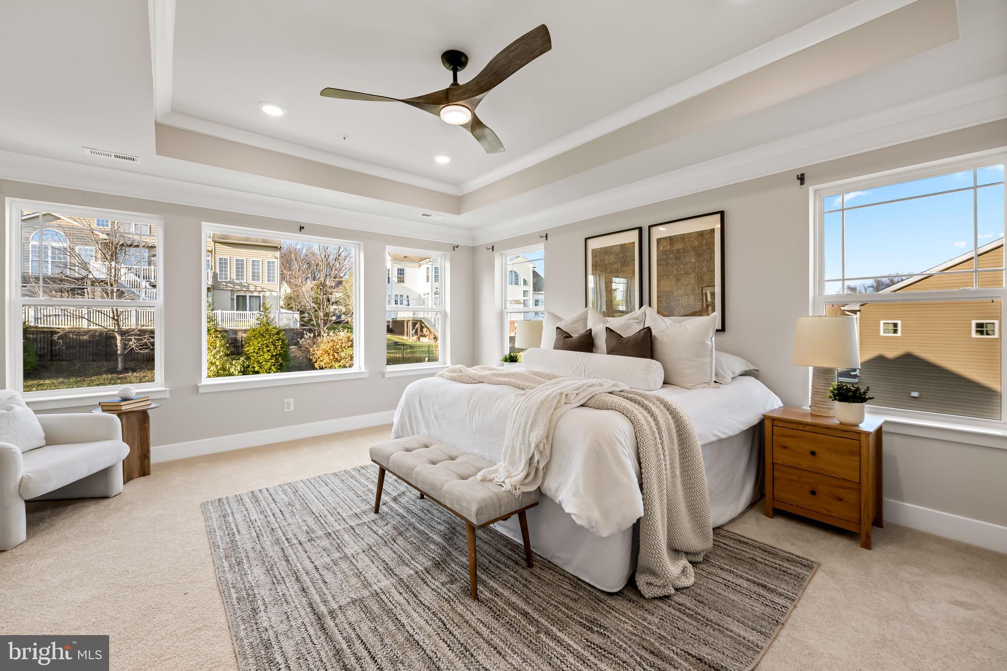 3704 Kahl Farm Road Perry Hall, MD 21128 - Photo 30 of 52 a spacious bedroom with a large bed and a couch