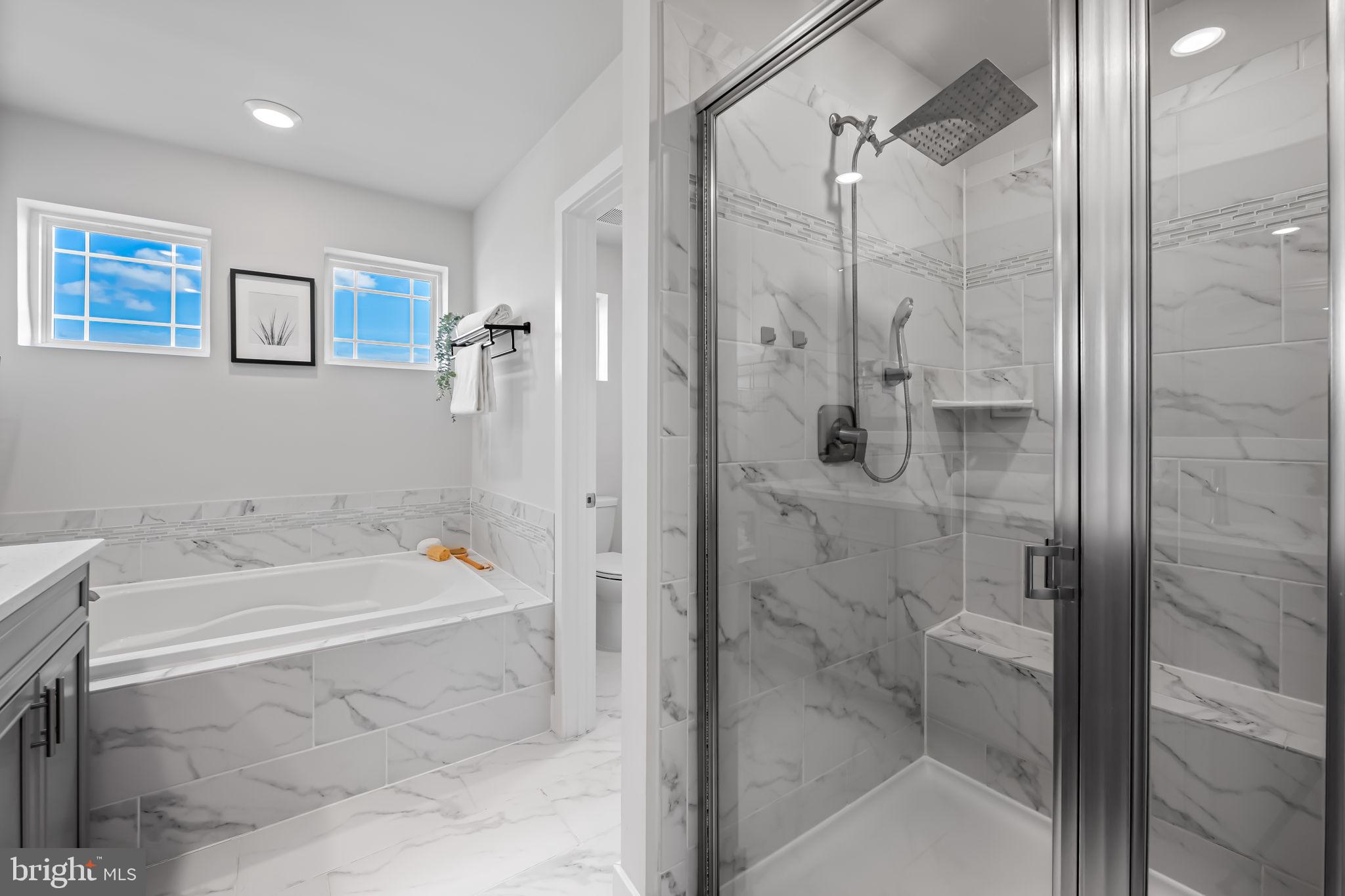 3704 Kahl Farm Road Perry Hall, MD 21128 - Photo 35 of 52 a bathroom with a bathtub and a shower