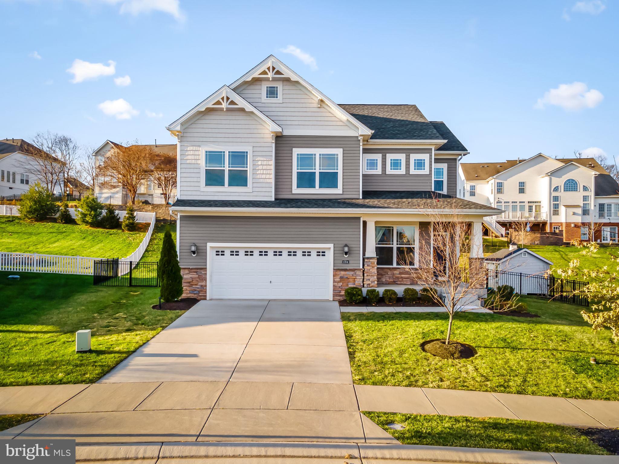 3704 Kahl Farm Road Perry Hall, MD 21128 - Photo 6 of 52 a front view of a house with a yard