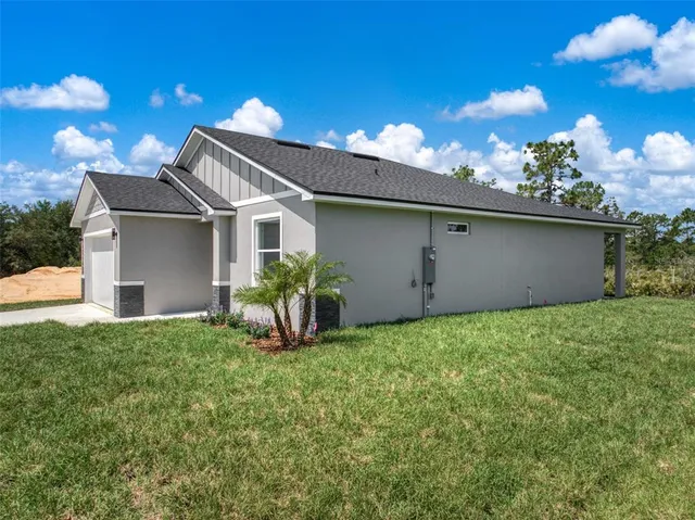 a house view with a garden space