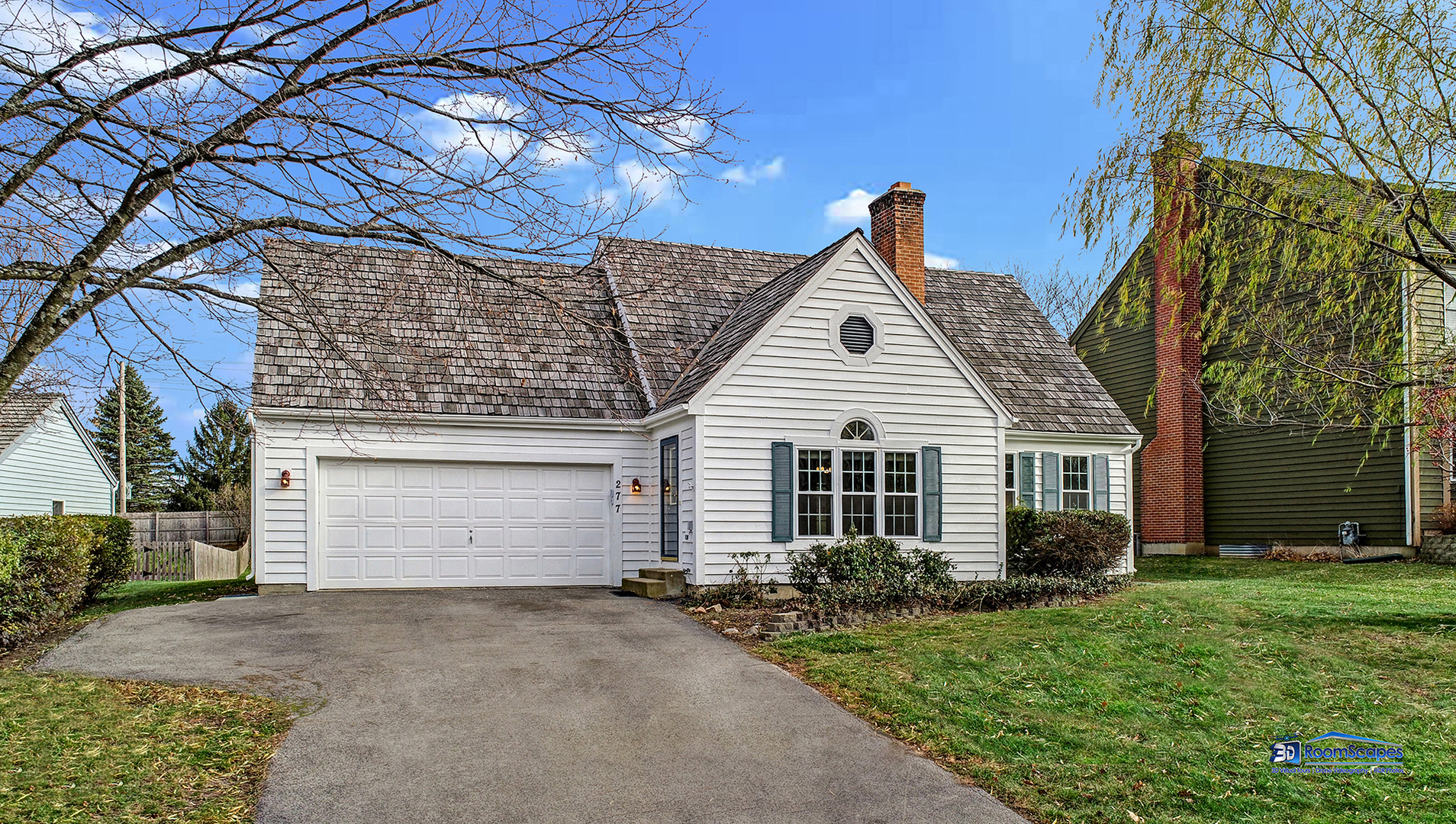 277 Mayflower Court Gurnee, IL 60031 - Photo 3 of 42 a front view of a house with a yard and garage