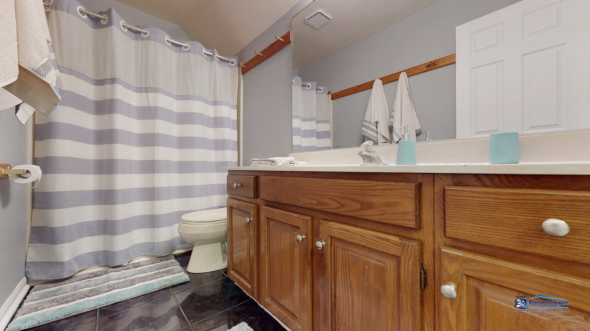 277 Mayflower Court Gurnee, IL 60031 - Photo 23 of 42 a bathroom with a sink toilet and shower