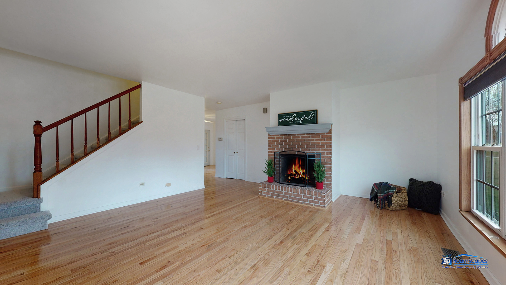 277 Mayflower Court Gurnee, IL 60031 - Photo 6 of 42 a view of a livingroom with wooden floor and a fireplace