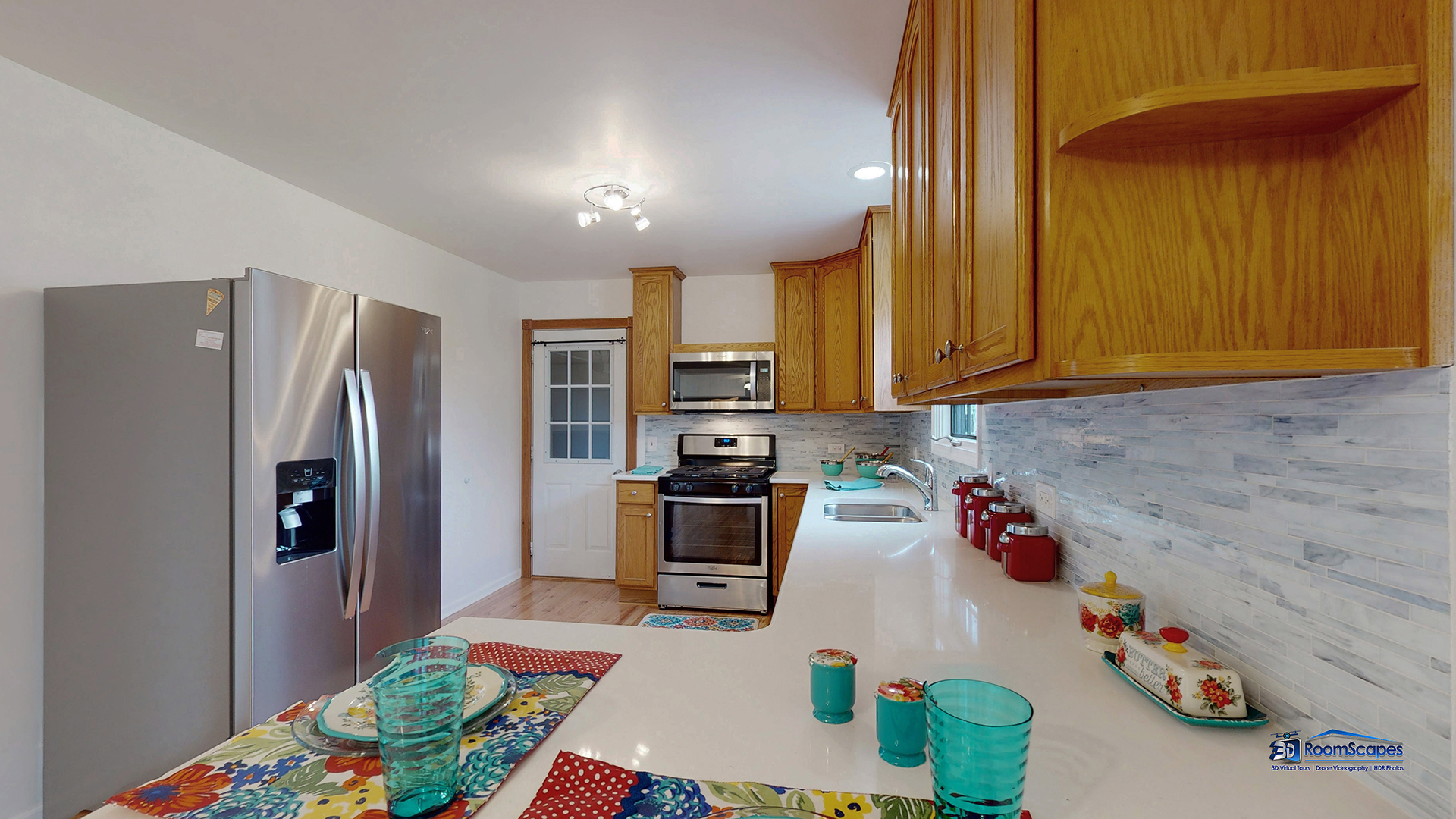 277 Mayflower Court Gurnee, IL 60031 - Photo 10 of 42 a kitchen with stainless steel appliances granite countertop a refrigerator and a stove