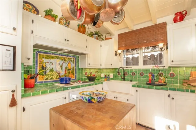 a patio with a table and chairs