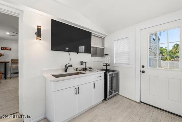 a view of a swimming pool with an outdoor seating and yard