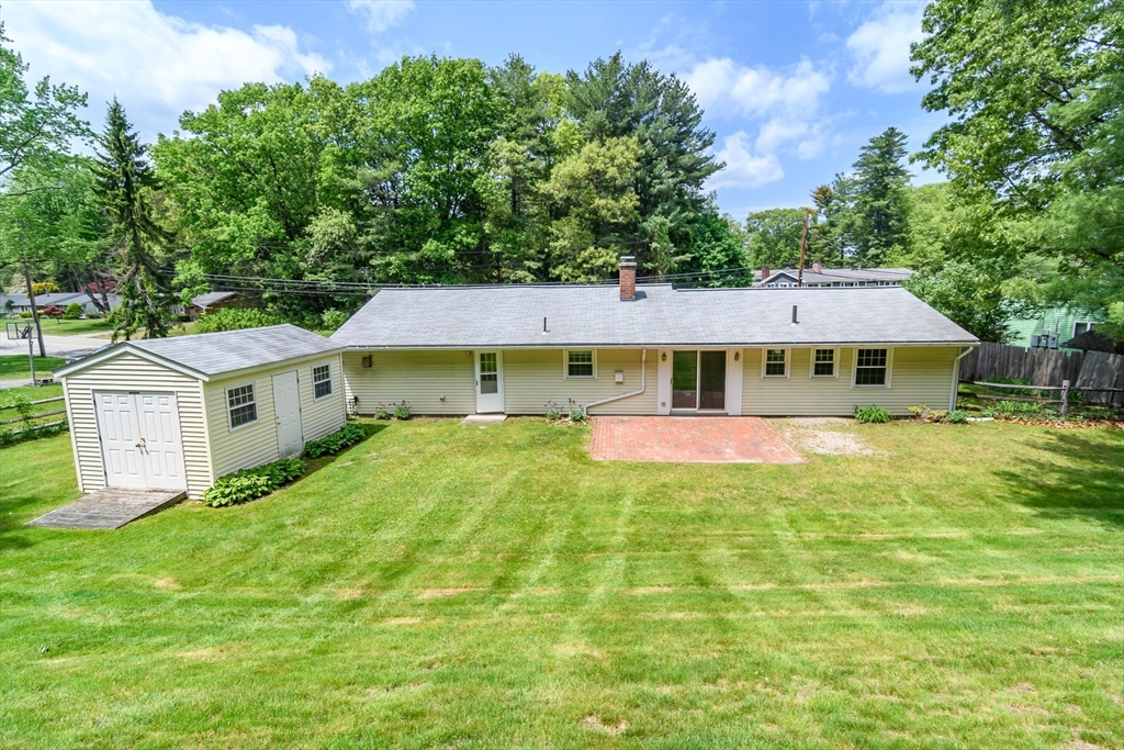 33 Eisenhower Road Framingham, MA 01701 - Photo 17 of 20 a front view of a house with a yard