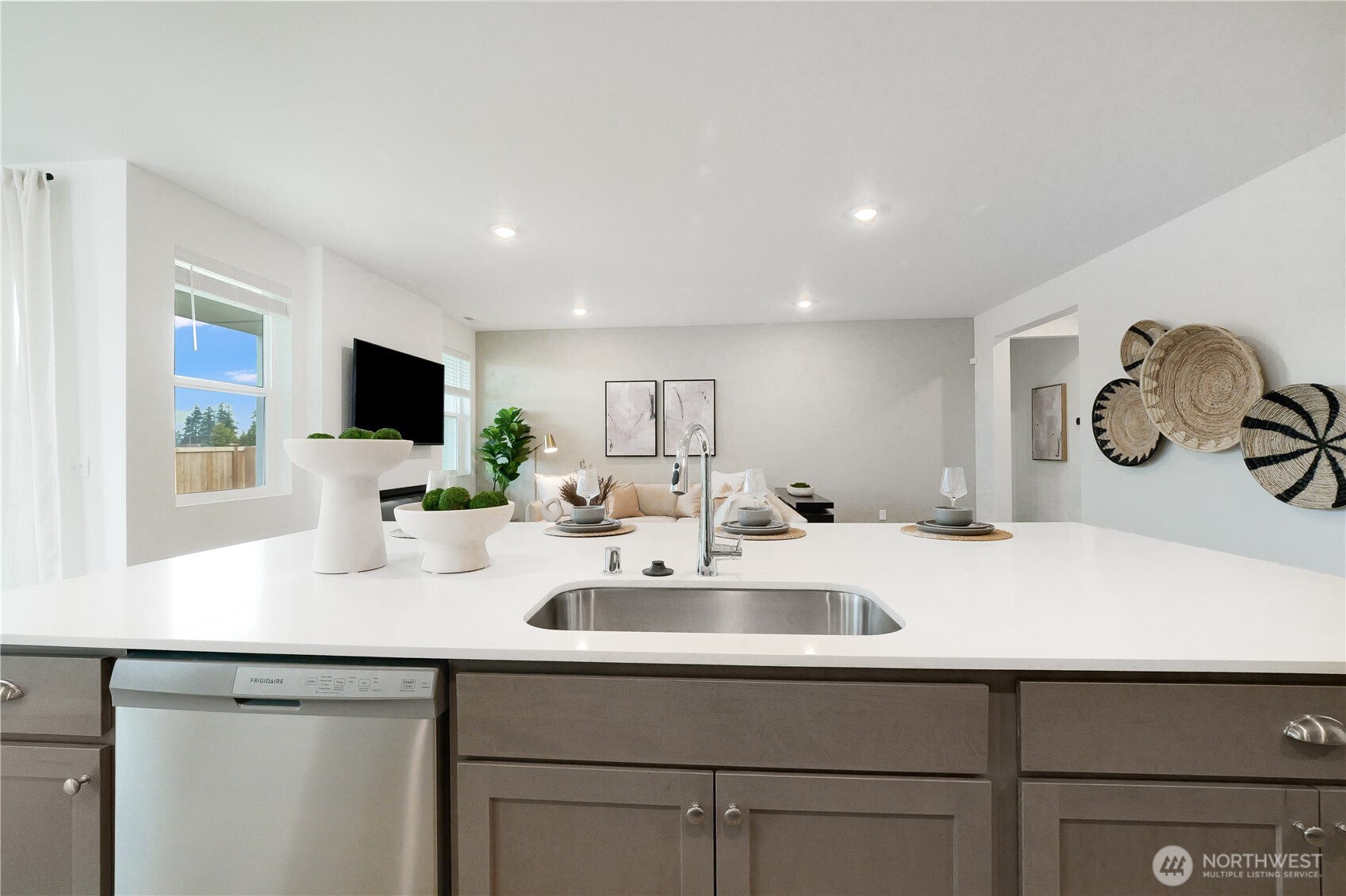 92 Moonshadow Lane Sequim, WA 98382 - Photo 5 of 27 a kitchen with a sink and a stove top oven