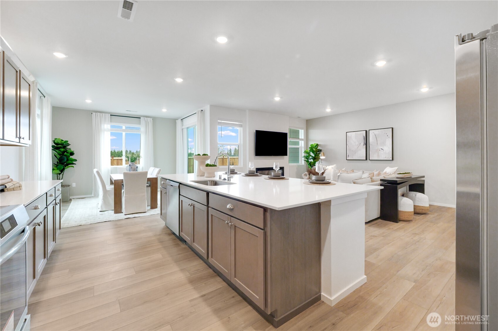 92 Moonshadow Lane Sequim, WA 98382 - Photo 7 of 27 a kitchen with counter top space a sink cabinets and appliances