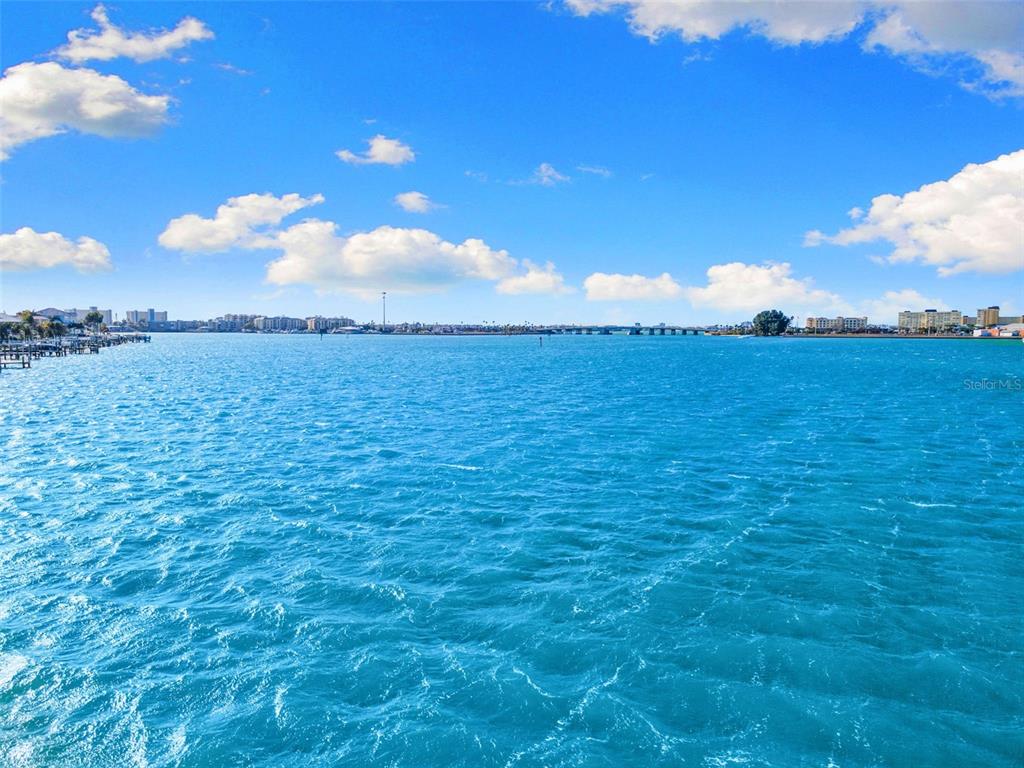850 Bay Point Drive Madeira Beach, FL 33708 - Photo 37 of 59 a view of a lake and sunset