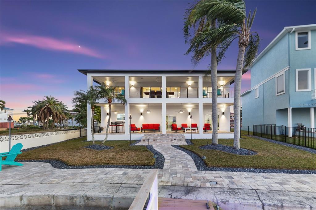 850 Bay Point Drive Madeira Beach, FL 33708 - Photo 46 of 59 a view of a chairs and table in a patio