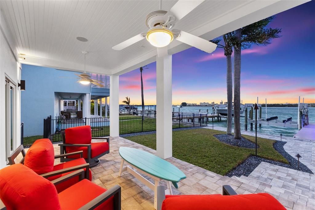 850 Bay Point Drive Madeira Beach, FL 33708 - Photo 47 of 59 a outdoor living space with furniture and a garden