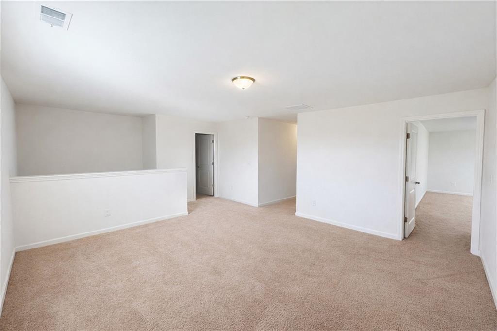 5075 Minnow Lane Cumming, GA 30028 - Photo 14 of 31 a view of an empty room