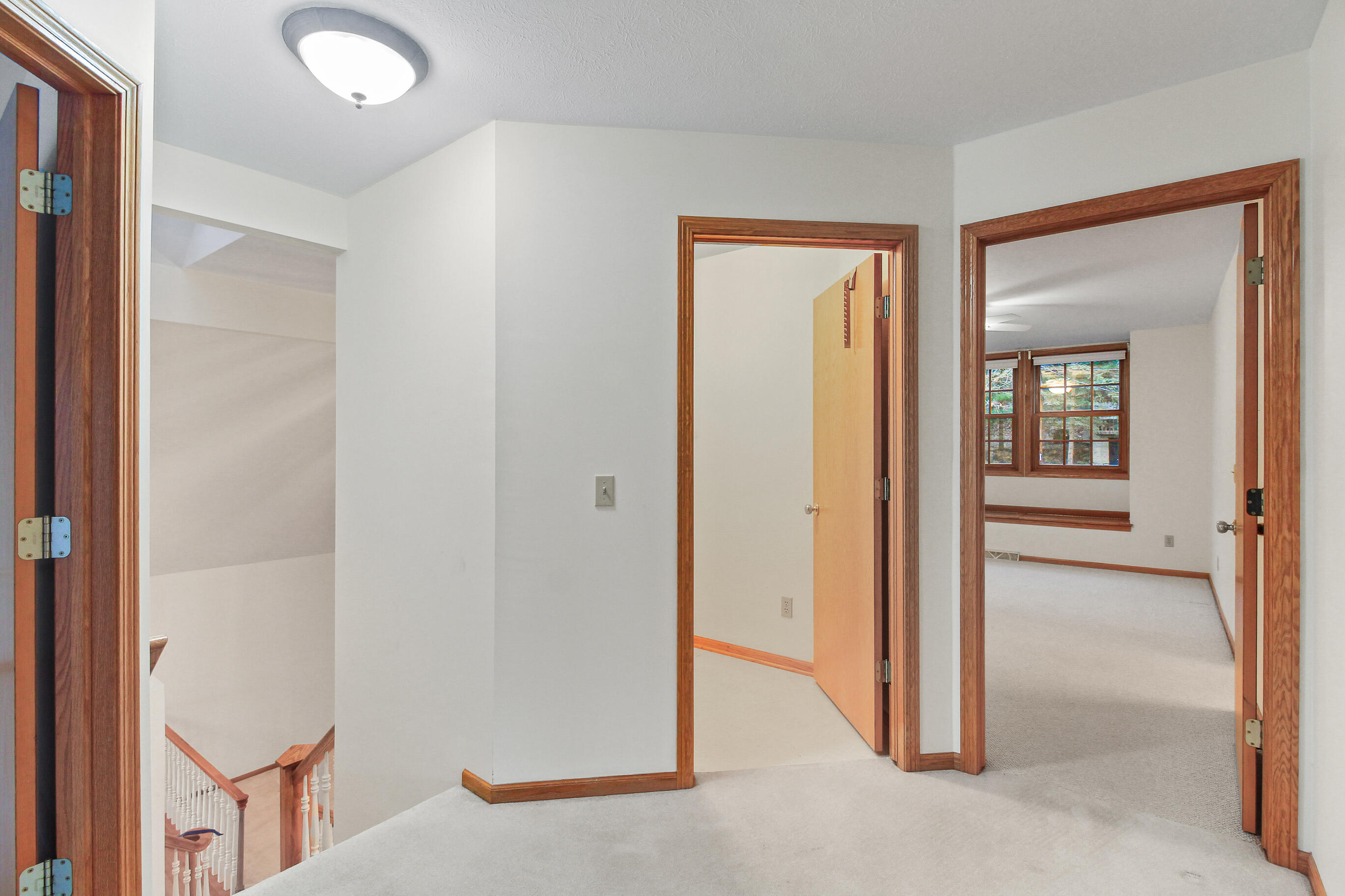 N7045 Oakwood Road Richmond, WI 53190 - Photo 29 of 69 Staircase, Laundry, 2nd Bedroom