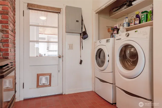 a utility room with dryer and washer