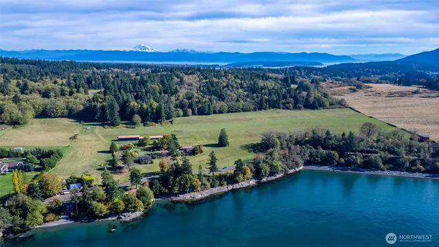 a view of a city with mountains in the background
