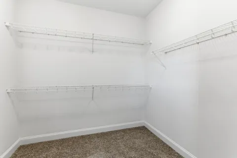 a view of a room with racks on the wall