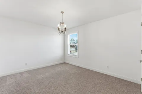 a view of empty room with windows