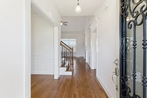 a view of entryway with wooden floor