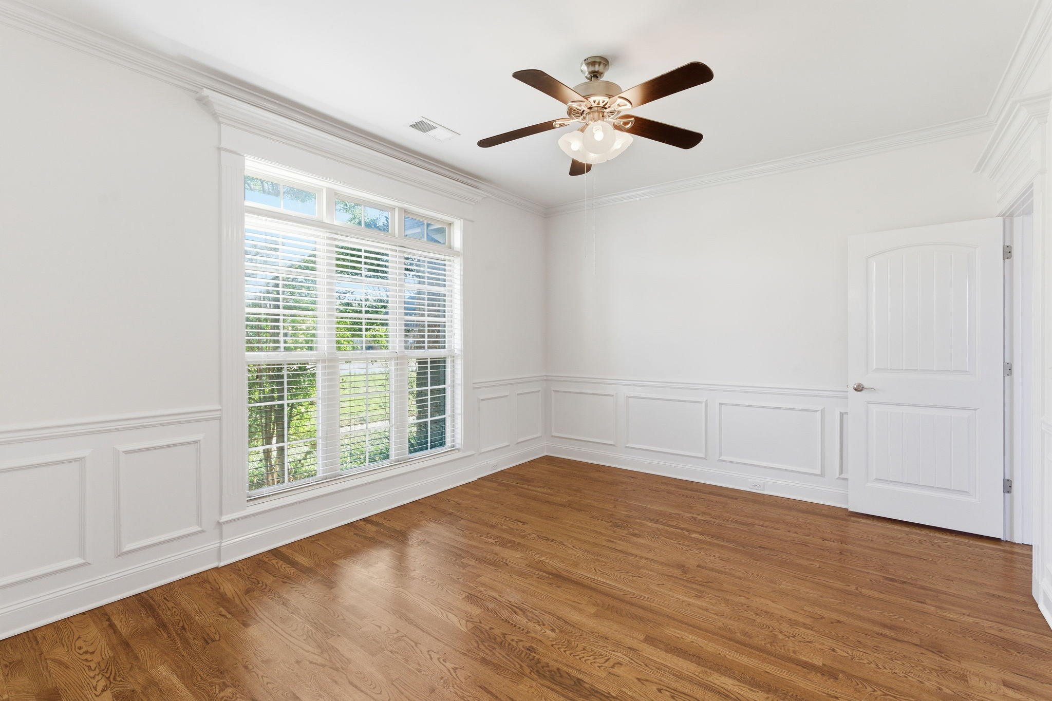 1246 Rimrock Road Smyrna, TN 37167 - Photo 5 of 36 an empty room with wooden floor and windows