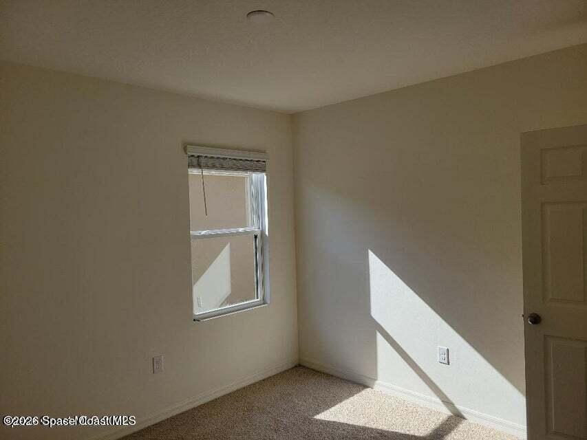 3619 Foggy Mist Road Southeast Palm Bay, FL 32909 - Photo 10 of 18 a view of an entryway