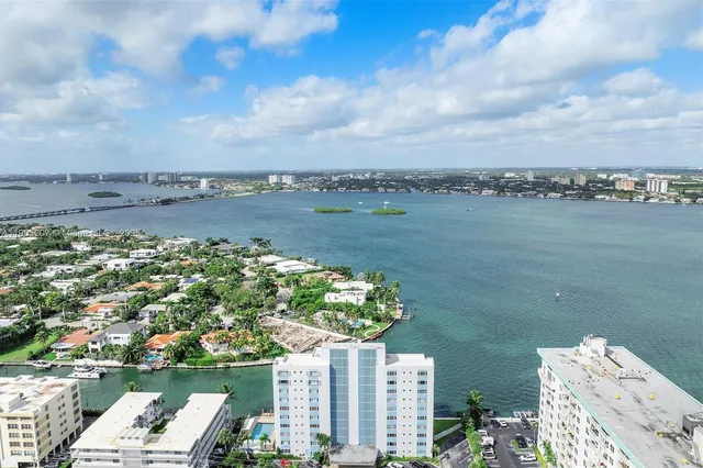 a view of a lake with a city