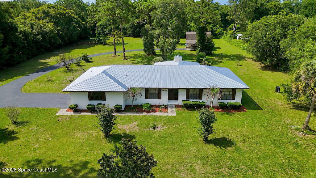 4028 McCullough Road Mims, FL 32754 - Photo 1 of 37 1B5ECFAE-D649-4EB1-8C07-6E8496AD4C5D