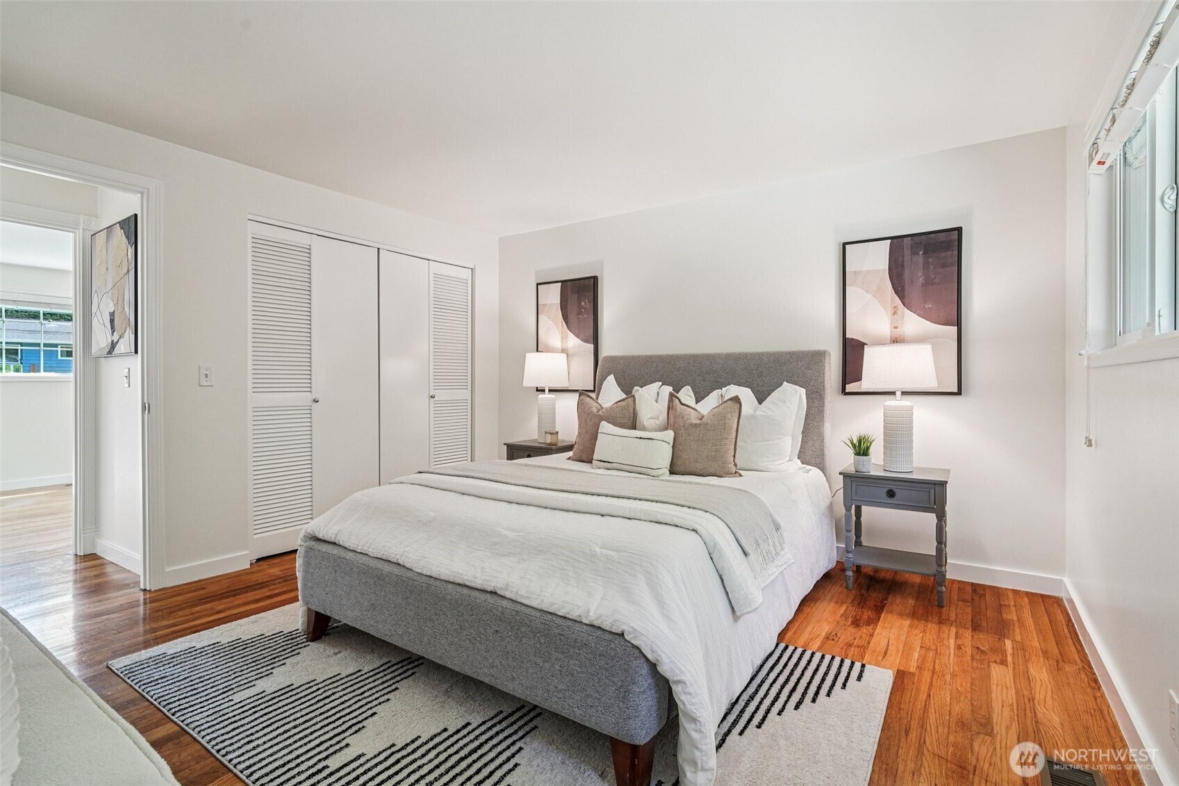 17841 4th Avenue Northwest Shoreline, WA 98177 - Photo 11 of 33 a bed room with a bed and a night stand