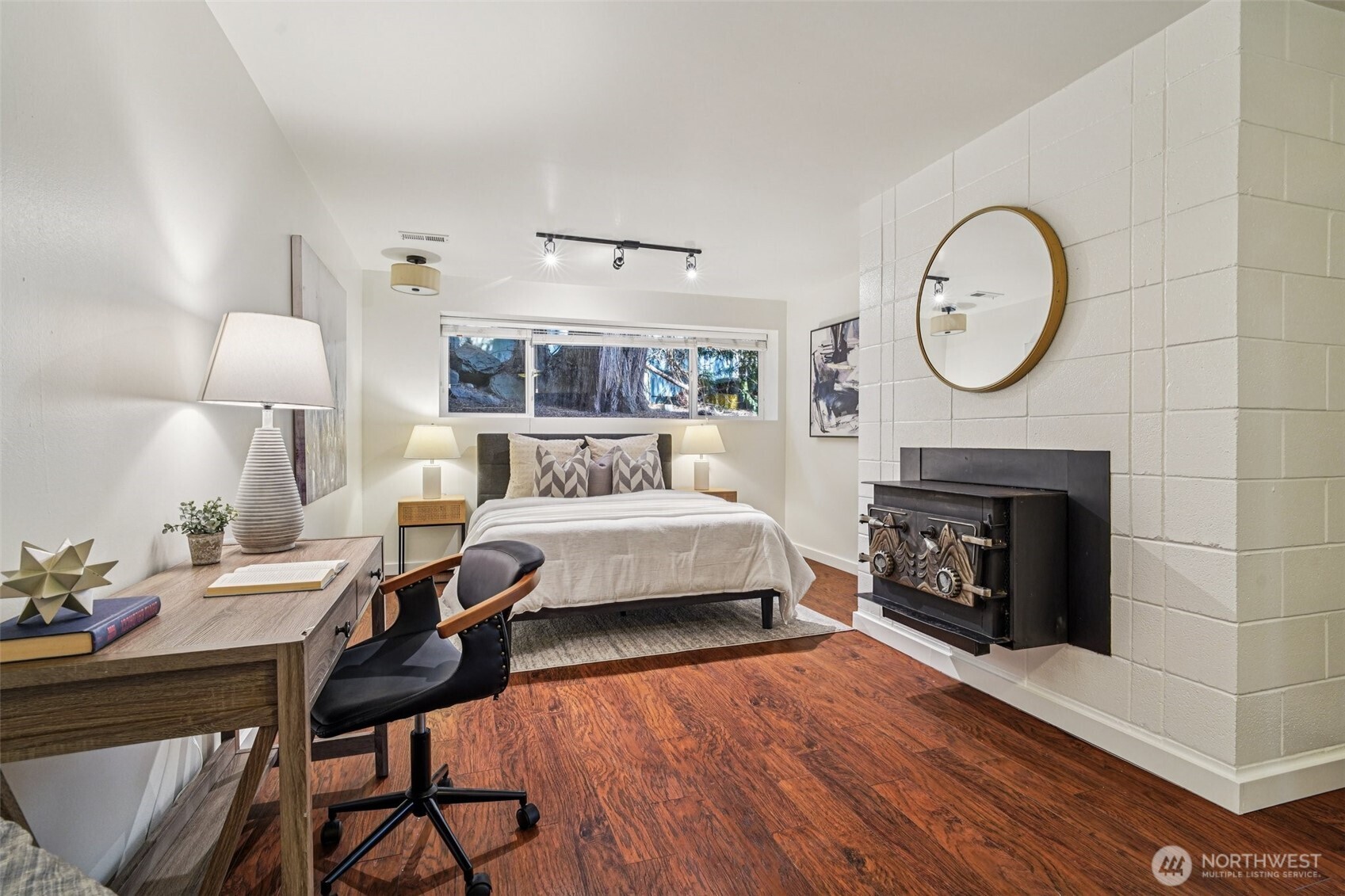 17841 4th Avenue Northwest Shoreline, WA 98177 - Photo 18 of 33 a bedroom with a bed and a fireplace