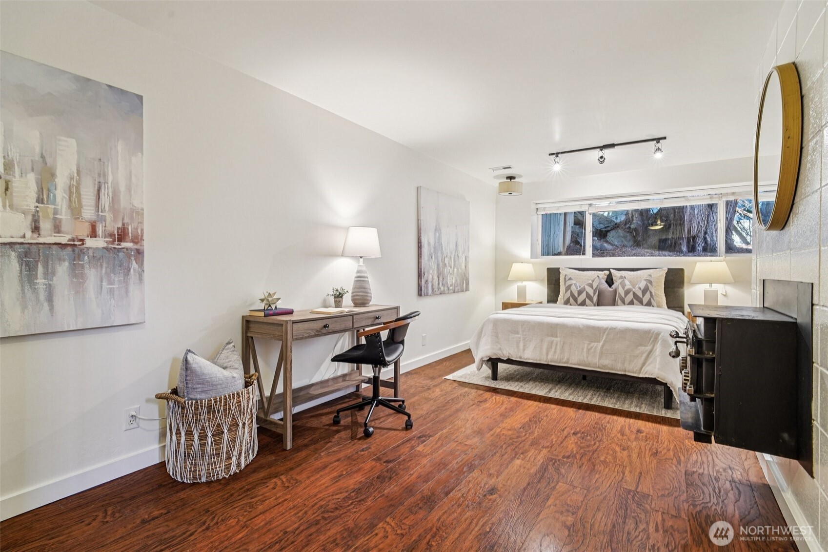 17841 4th Avenue Northwest Shoreline, WA 98177 - Photo 19 of 33 a bedroom with a bed and wooden floor