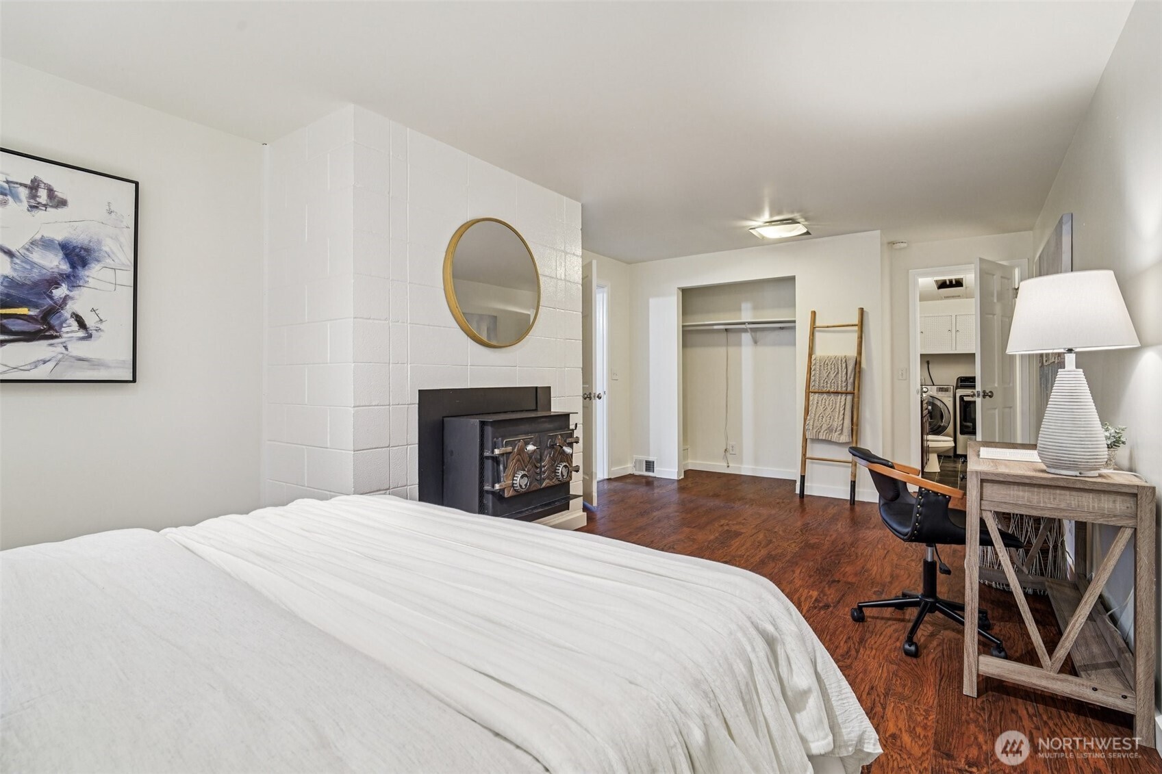 17841 4th Avenue Northwest Shoreline, WA 98177 - Photo 20 of 33 a spacious bedroom with a bed and a table in it