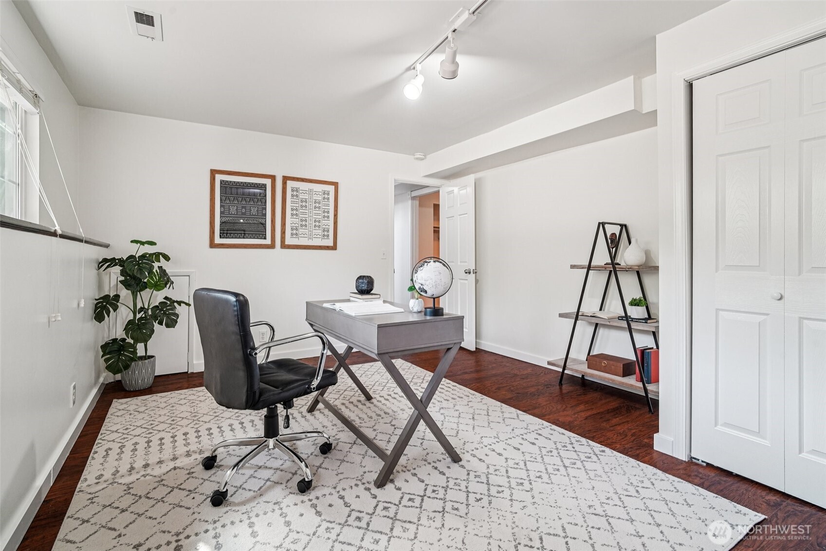 17841 4th Avenue Northwest Shoreline, WA 98177 - Photo 23 of 33 a workspace with furniture and wooden floor