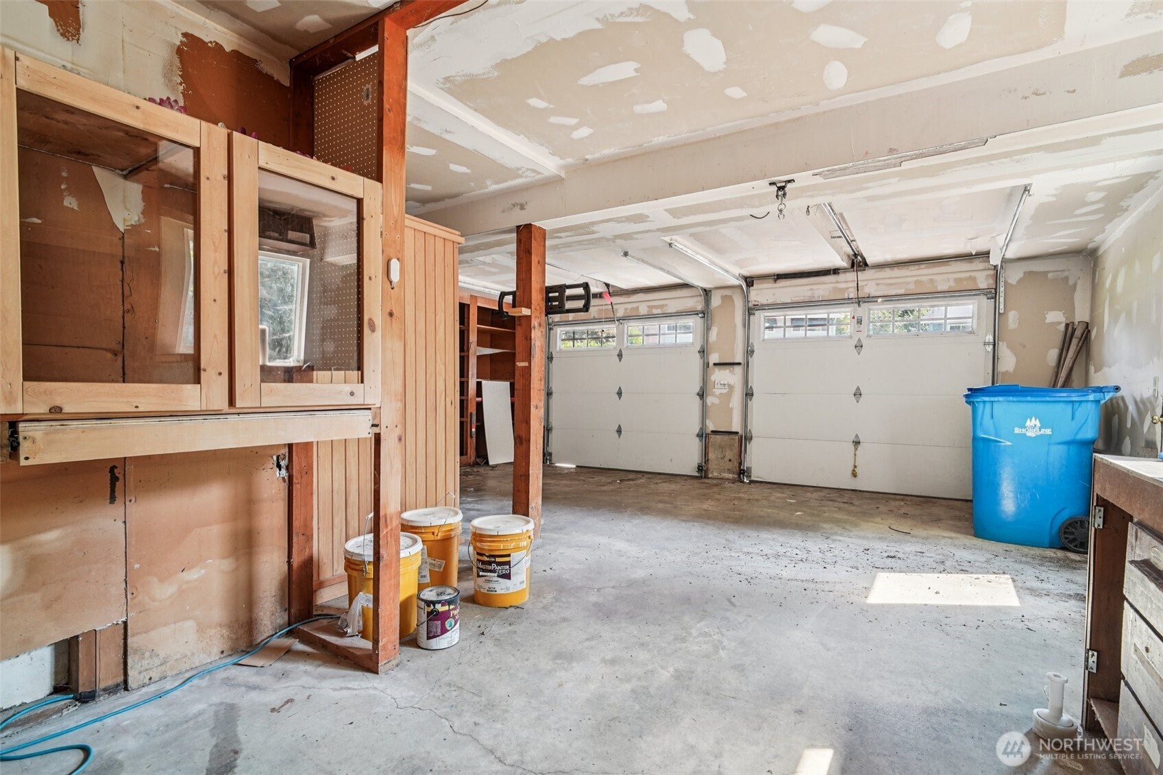 17841 4th Avenue Northwest Shoreline, WA 98177 - Photo 26 of 33 a view of a garage with table and chairs