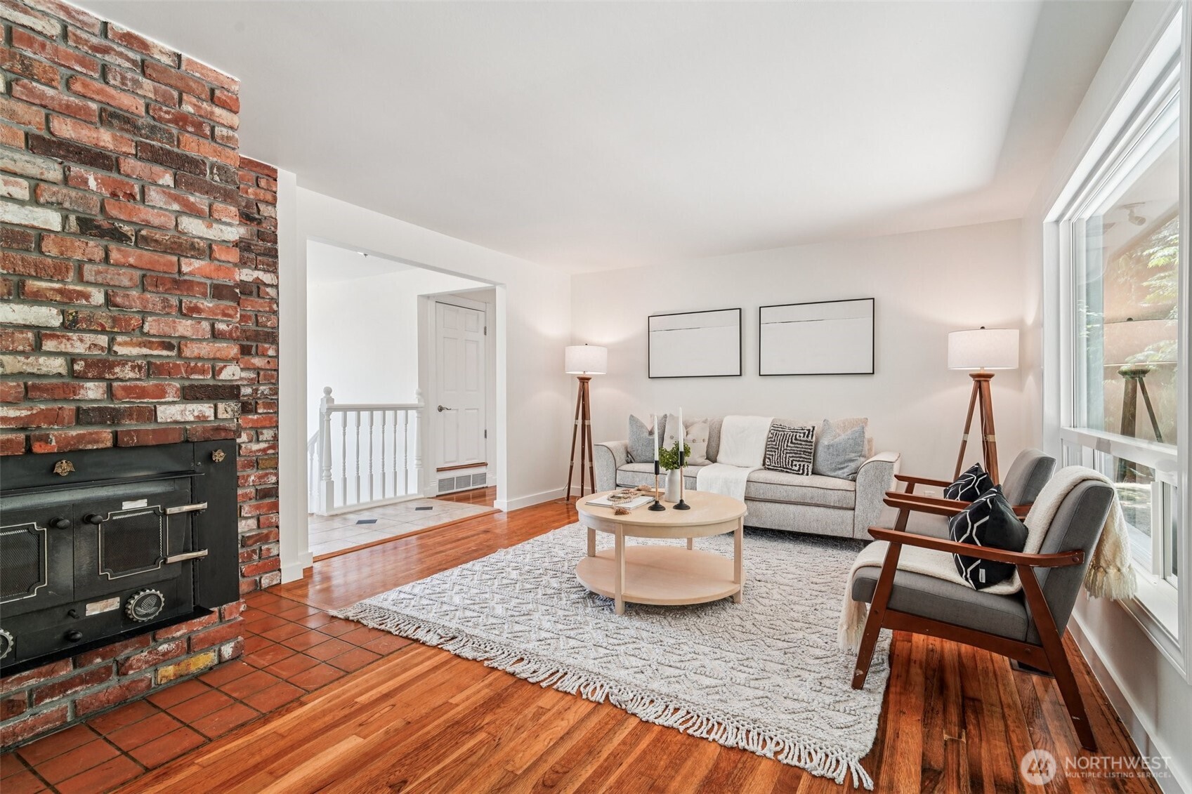 17841 4th Avenue Northwest Shoreline, WA 98177 - Photo 3 of 33 a living room with furniture and a fireplace