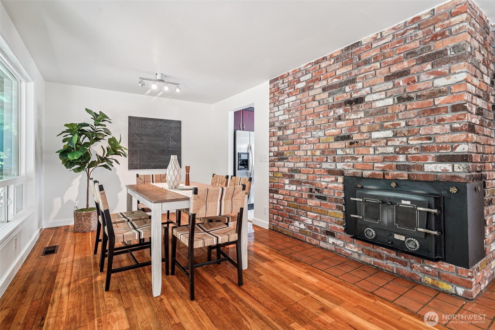 17841 4th Avenue Northwest Shoreline, WA 98177 - Photo 5 of 33 a dining room with furniture and wooden floor