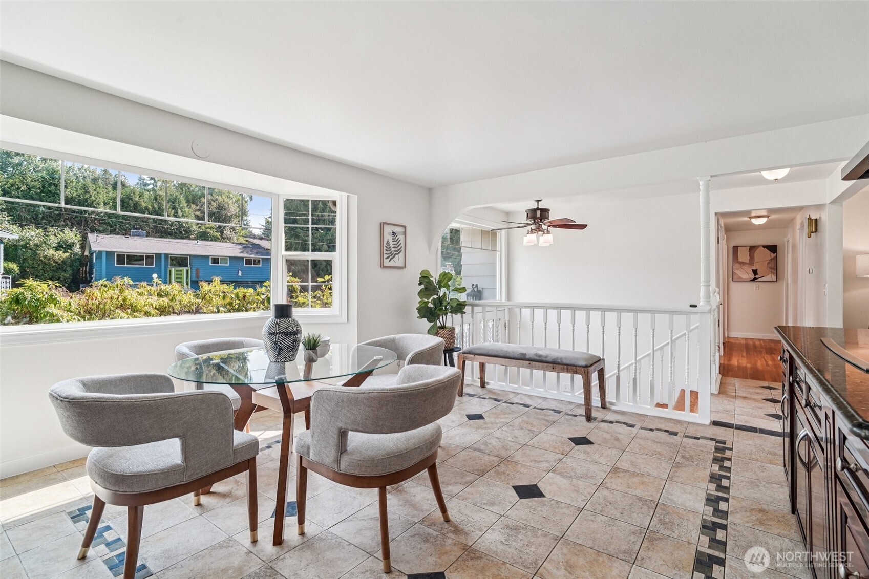 17841 4th Avenue Northwest Shoreline, WA 98177 - Photo 7 of 33 a dining room with furniture and a floor to ceiling window