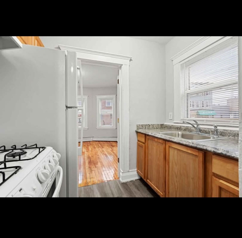 2 Kingsley Terrace, Unit 7 Lynn, MA 01902 - Photo 2 of 13 a view of a kitchen area with sink