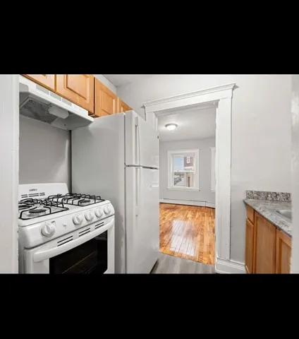 a view of kitchen and stove