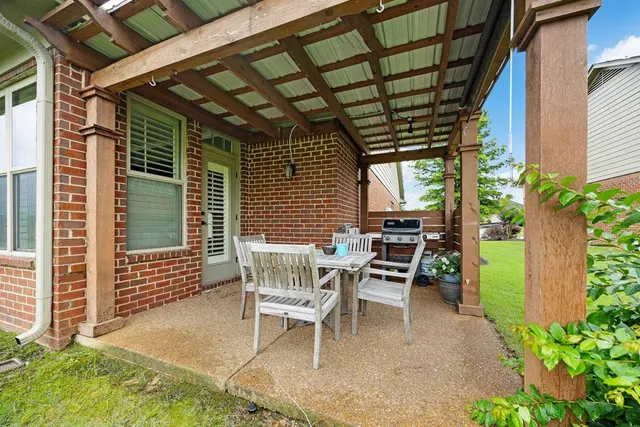 a view of chair and table in the patio