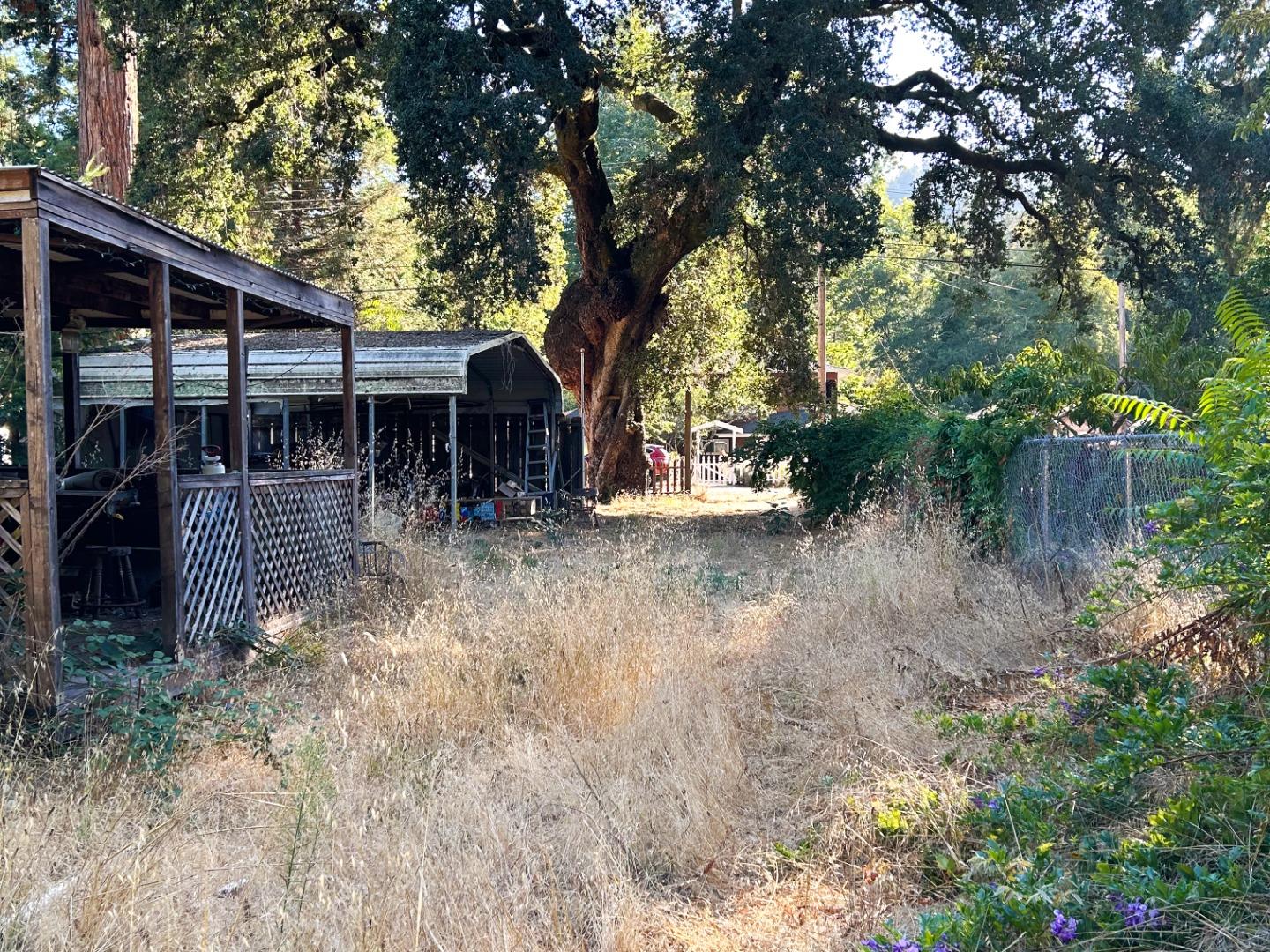0 Riverside Avenue Ben Lomond, CA 95005 - Photo 2 of 8 a view of a house with a yard