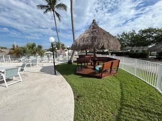 100 Morr Ln C5 Key Largo, FL 33037 - Photo 19 of 21 a view of a backyard with sitting area