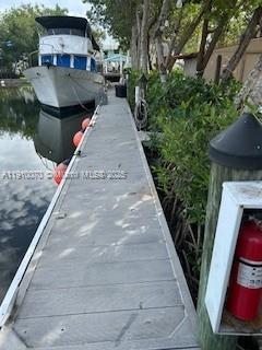 100 Morr Ln C5 Key Largo, FL 33037 - Photo 3 of 21 a view of a patio with a yard