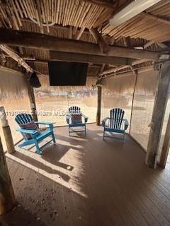 100 Morr Ln C5 Key Largo, FL 33037 - Photo 10 of 21 a view of water heater room with wooden floor