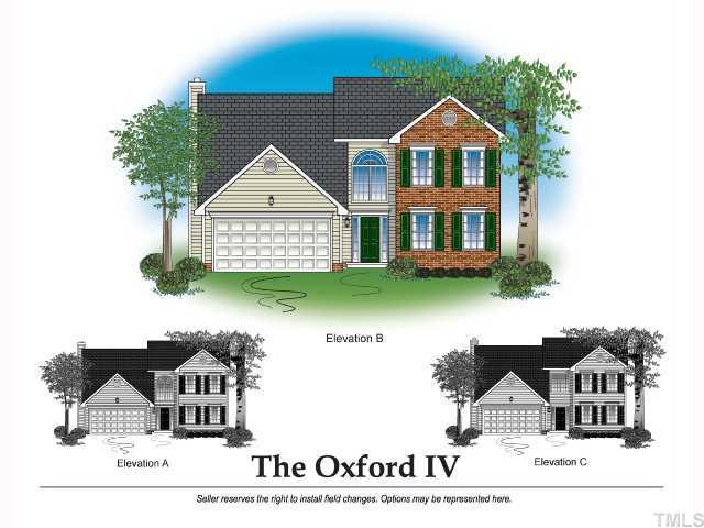 5531 Quitman Trail Raleigh, NC 27610 - Photo 1 of 2 a front view of a house with a garden