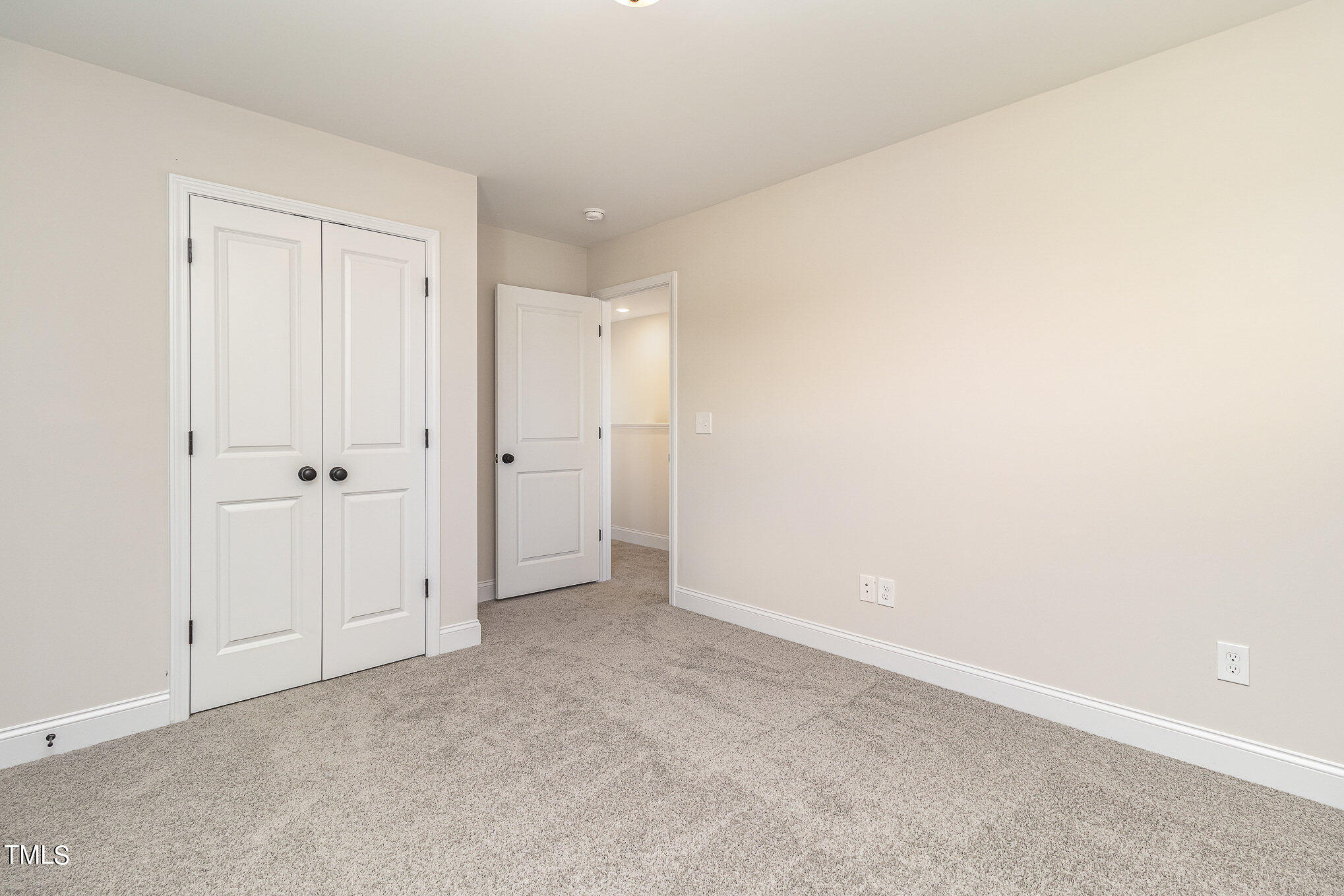 299 Jackson Pond Drive Smithfield, NC 27577 - Photo 21 of 25 an empty room with an entryway
