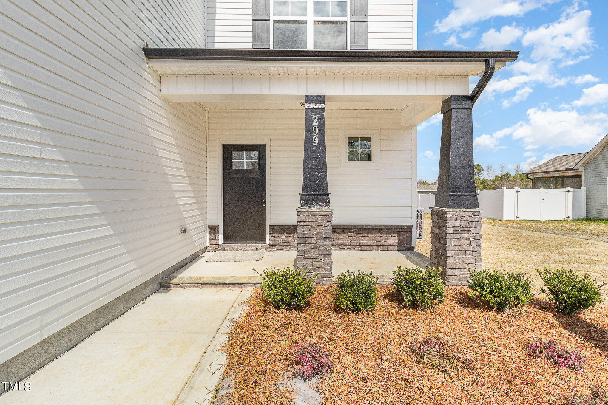 299 Jackson Pond Drive Smithfield, NC 27577 - Photo 4 of 25 a front view of a house with a yard