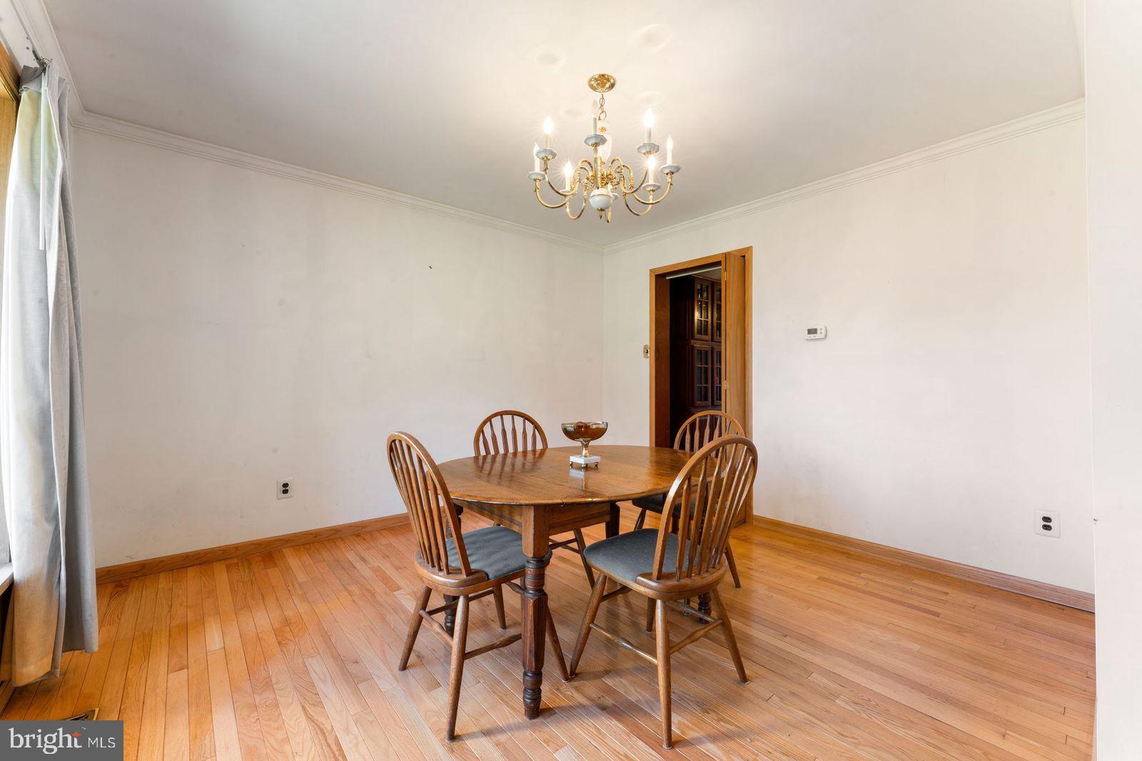 2015 Butternut Drive Huntingdon Valley, PA 19006 - Photo 11 of 40 a view of a dining room with furniture and chandelier